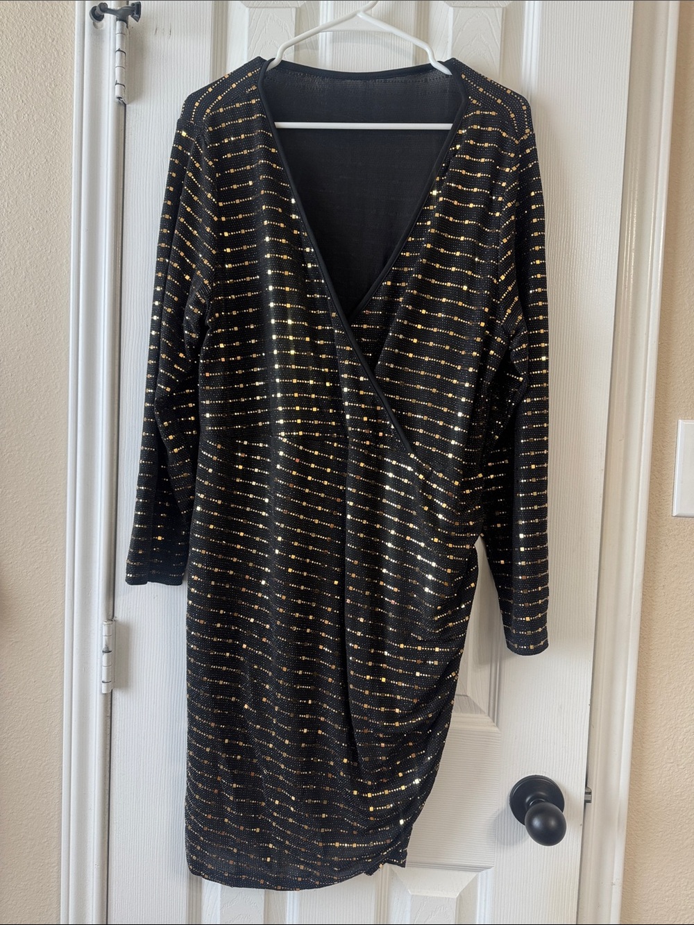Black Long Sleeve Wrap Dress with Gold Stripe Accents